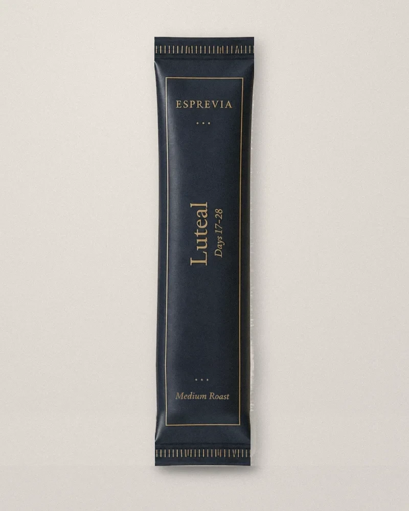 The Luteal sachet in navy with gold foil lettering.