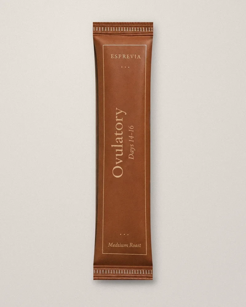 The Ovulatory sachet in rust with gold foil lettering.